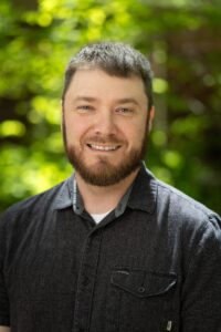 A headshot of Will Dickerson